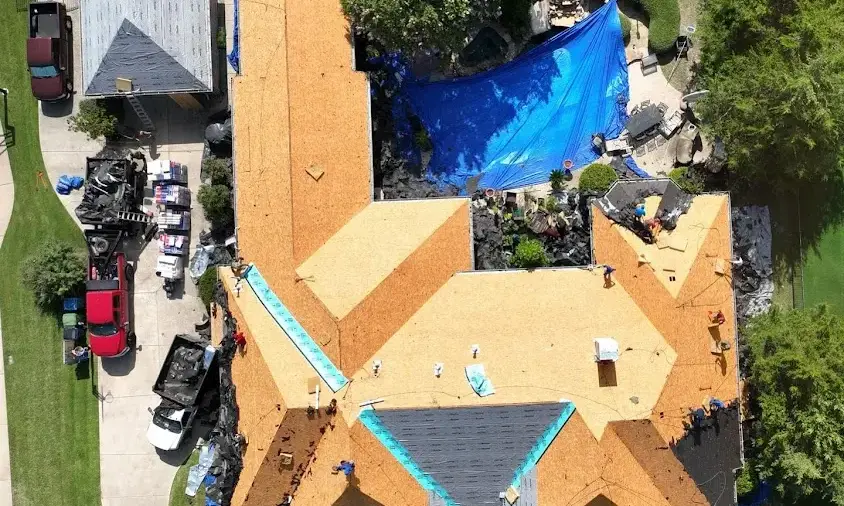Professional Storm Damage Roof Repair being performed in Hot Springs Village